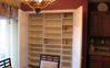 Interior of built-in pantry showing new organization shelving towers.