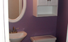 Finished powder room with new bathroom fixtures and paint.  Clean design and on budget.